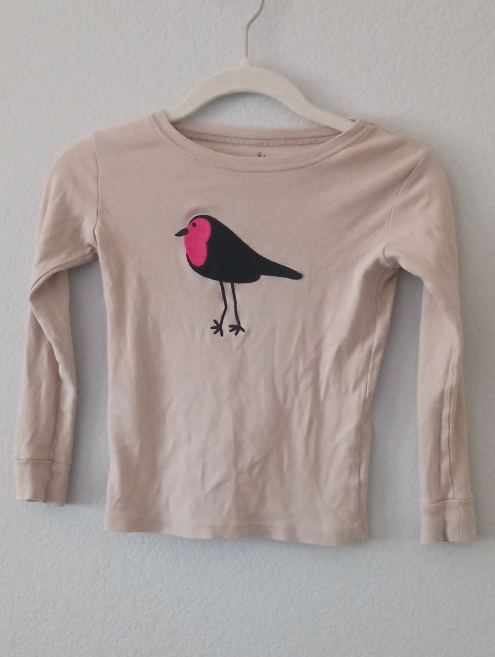 10/$13❗️SALE❗️🔴Kids Long-Sleeve Beige Top with Pink-Black Bird Graphic